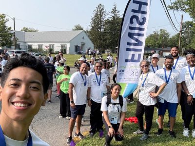 Small group at finish sign